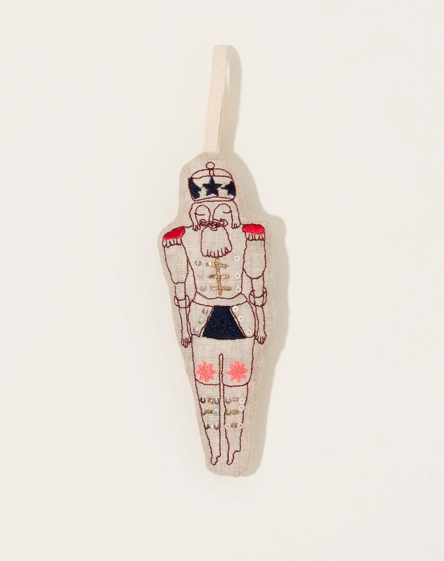 "Skippy Cotton Christmas Nutcracker Ornament - Handmade Holiday Decor for Tree & Gifts"