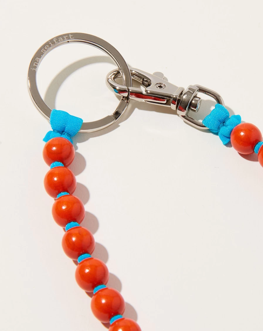 Ina Seifart Orange and Turquoise Long Key Holder with Pearl Accents