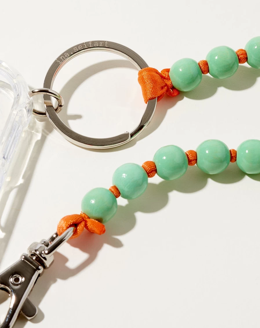 Ina Seifart Pastel Green iPhone Necklace with Orange Accent - Stylish Handy Chain for Smartphones