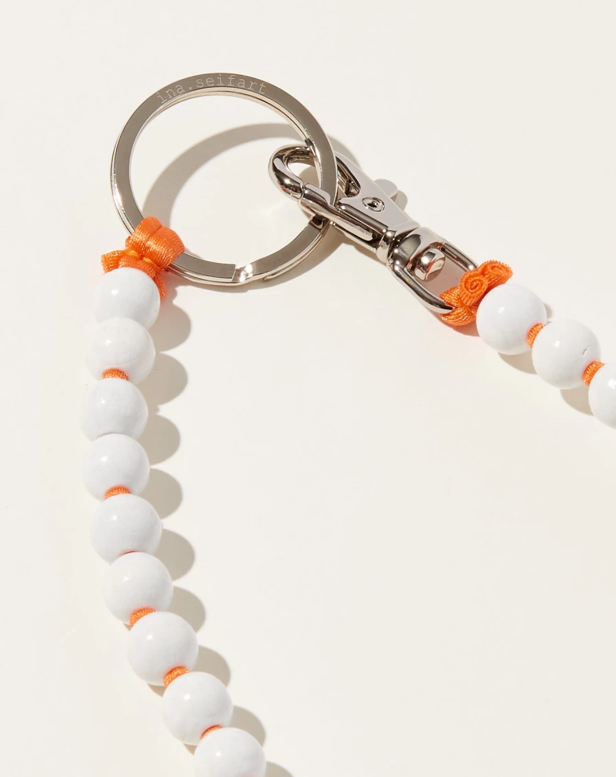 Ina Seifart White and Orange Perlen Long Key Holder – Stylish Keychain Accessory